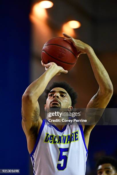 Eric Carter of the Delaware Fightin Blue Hens shoots a free throw against the Elon Phoenix during the first half at the Bob Carpenter Center on...