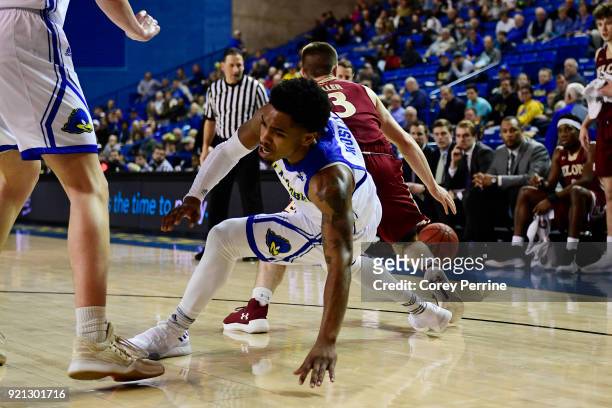 Anthony Mosley of the Delaware Fightin Blue Hens loses his footing against Seth Fuller of the Elon Phoenix during the second half at the Bob...