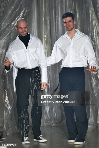 Designers Matthew Harding and Levi Palmer walk the runway at the Palmer Harding Ready to Wear Fall/Winter 2018-2019 fashion show during London...