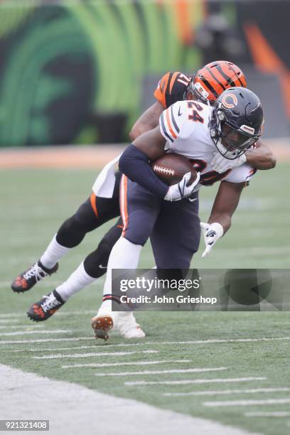 Jordan Howard of the Chicago Bears runs the football upfield during the game against the Cincinnati Bengals at Paul Brown Stadium on December 10,...