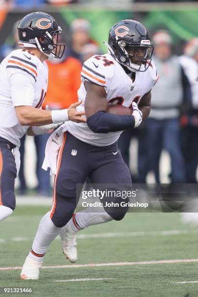 Jordan Howard of the Chicago Bears runs the football upfield during the game against the Cincinnati Bengals at Paul Brown Stadium on December 10,...