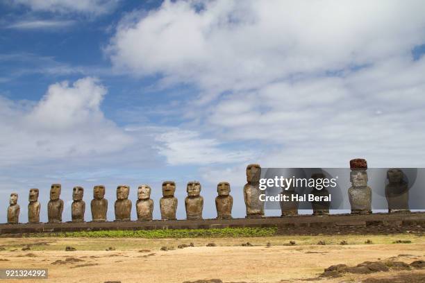 fifteen statues called moai on easter island - moai hat stock pictures, royalty-free photos & images