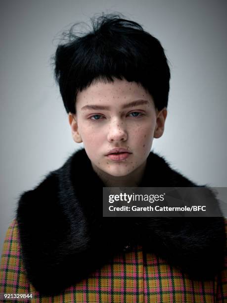 Model backstage ahead of the Shrimps Presentation during London Fashion Week February 2018 at TopShop Show Space on February 20, 2018 in London,...