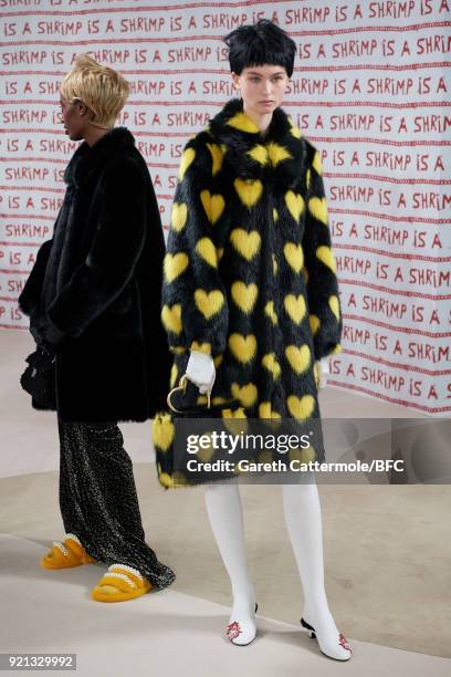 Model poses at the Shrimps Presentation during London Fashion Week February 2018 at TopShop Show Space on February 20, 2018 in London, England.