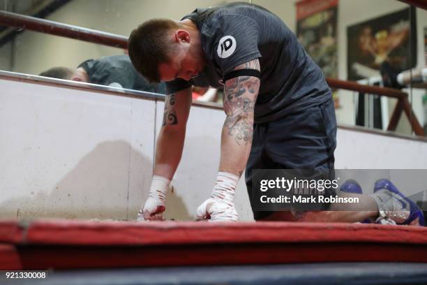 Carl Frampton stretches during a media work out session at VIP Boxing Gym on February 20, 2018 in Manchester, England.