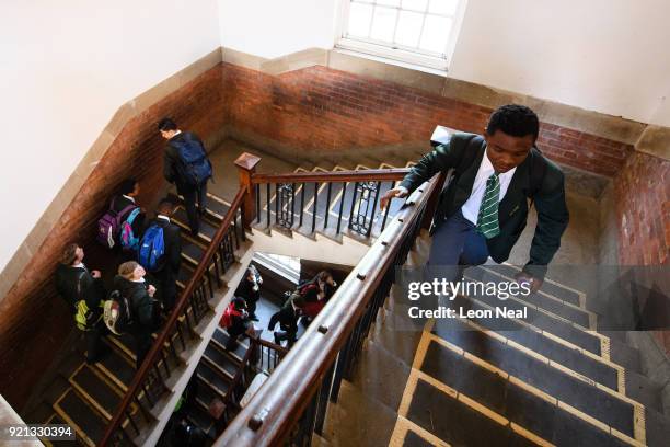 Students from the King Edward VII school move between classes on March 29, 2017 in Johannesburg, South Africa. Those born since the collapse of the...