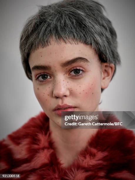 Model backstage ahead of the Shrimps Presentation during London Fashion Week February 2018 at TopShop Show Space on February 20, 2018 in London,...