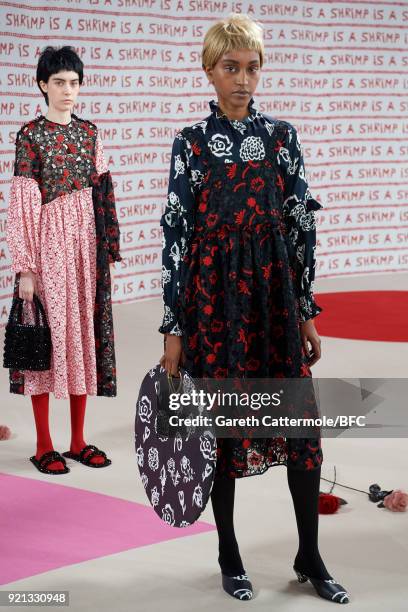 Models pose at the Shrimps Presentation during London Fashion Week February 2018 at TopShop Show Space on February 20, 2018 in London, England.