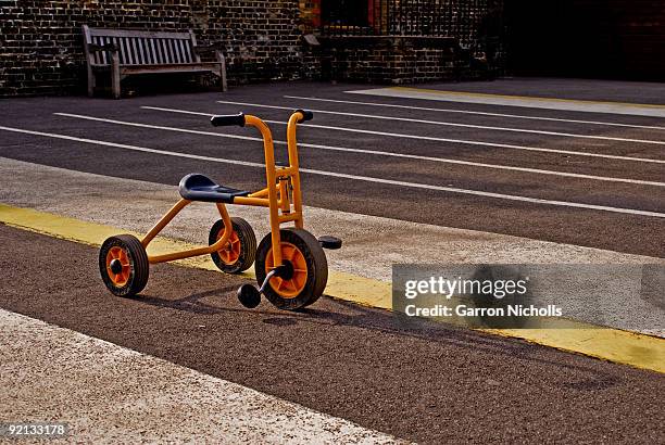 orange tricycle - tricycle stock pictures, royalty-free photos & images