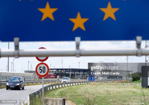 Car drives from Austria at the border crossing for the Austrian-Hungarian frontier on July 20, 2016 near Hegyeshalom, Hungary. Last summer thousands...