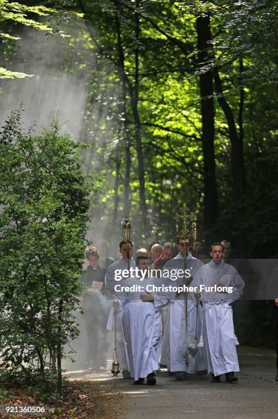 Seminarians and staff take part in the Corpus Christi procession in honour of the Eucharist on June 22, 2014 in Birmingham, England. St. Mary's...