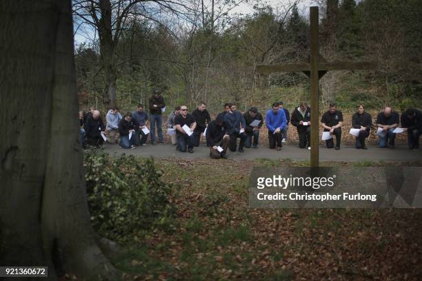 Seminarians and staff pray at the stations of the cross in the grounds of Oscott College during Easter services on April 14, 2014 in Birmingham,...