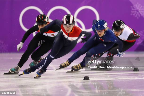 Andrea Keszler of Hungary, Lara Van Ruijven of the Netherlands, Elise Christie of Great Britain and Magdalena Warakomska of Poland compete during the...