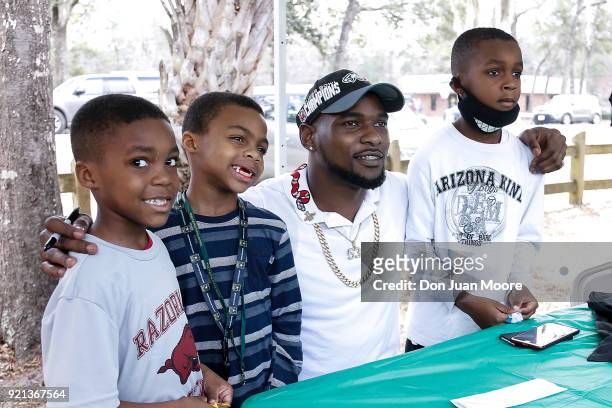 Linebacker Nigel Bradham of the Philadelphia Eagles take a picture with fans where he returns home as a Super Bowl Champion where he was honored as...
