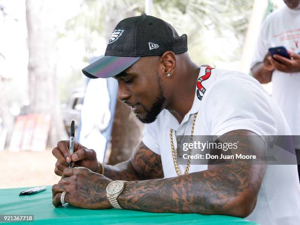 Linebacker Nigel Bradham of the Philadelphia Eagles signs some items for fans where he return home as a Super Bowl Champion where he was honored as...