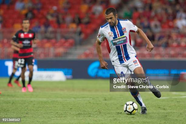 Nikolai Topor-Stanley of the Jets dribbles the ball during the round one A-League match between the Western Sydney Wanderers and the Newcastle Jets...
