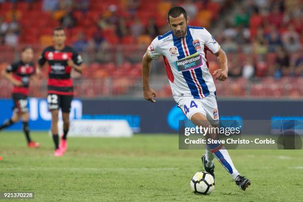 Nikolai Topor-Stanley of the Jets dribbles the ball during the round one A-League match between the Western Sydney Wanderers and the Newcastle Jets...