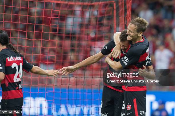 Oriol Riera of the Wanderers celebrates kicking a goal with Michael Thwaite during the round one A-League match between the Western Sydney Wanderers...