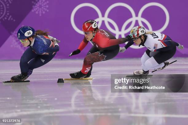 Kathryn Thomson of Great Britain, Valerie Maltais of Canada and Jessica Kooreman of the United States compete during the Ladies Short Track Speed...