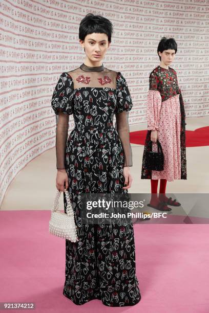 Model poses at the Shrimps Presentation during London Fashion Week February 2018 at TopShop Show Space on February 20, 2018 in London, England.