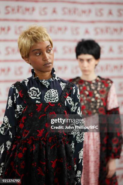 Models pose at the Shrimps Presentation during London Fashion Week February 2018 at TopShop Show Space on February 20, 2018 in London, England.