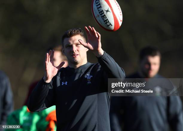 Dan Biggar of Wales catches the ball during a training session at Vale of Glamorgan on February 20, 2018 in Cardiff, Wales.