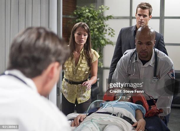 Melissa Claire Egan , Lucy Merriam , extra and Cameron Mathison in a scene that airs the week of October 12, 2009 on Disney General Entertainment...