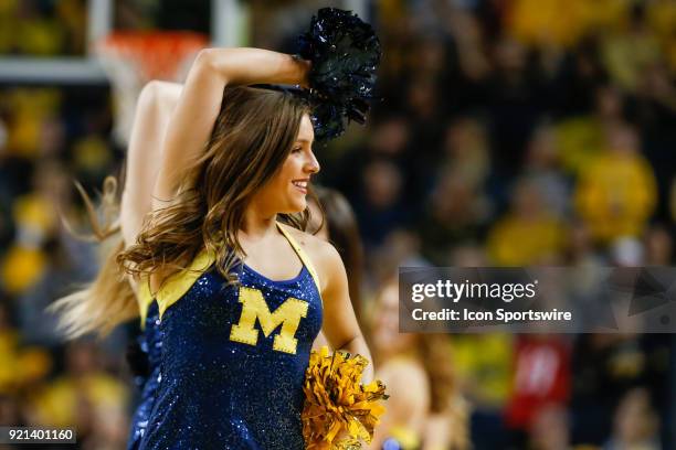 The Michigan dance team performs during a time out during a regular season Big 10 Conference basketball game between the Ohio State Buckeyes and the...