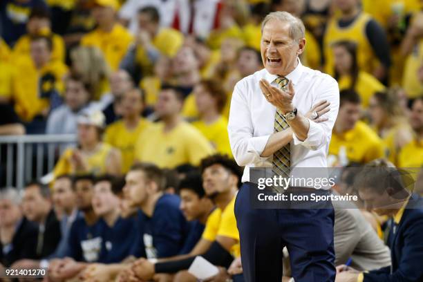 Michigan Wolverines head coach John Beilein questions an official's call during a regular season Big 10 Conference basketball game between the Ohio...