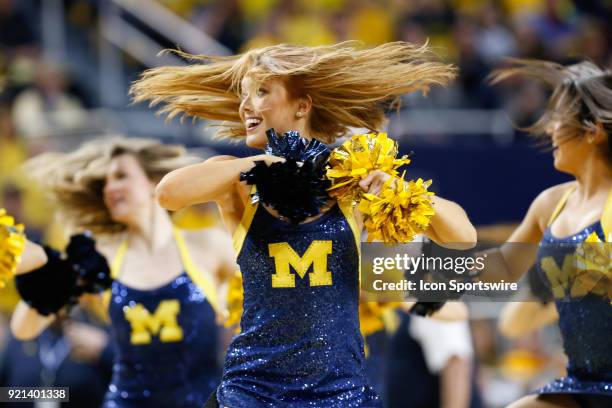 The Michigan dance team performs during a time out during a regular season Big 10 Conference basketball game between the Ohio State Buckeyes and the...