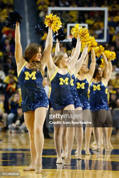 The Michigan dance team performs during a timeout during a regular season Big 10 Conference basketball game between the Ohio State Buckeyes and the...