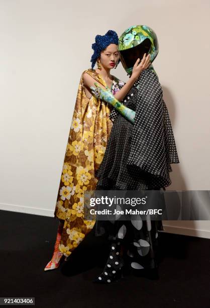 Models backstage ahead of the Richard Quinn show during London Fashion Week February 2018 at BFC Show Space on February 20, 2018 in London, England.