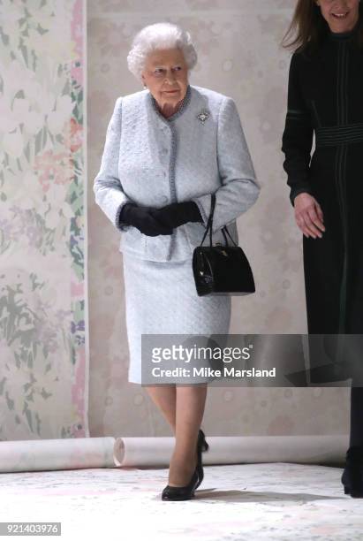 Queen Elizabeth II attends the Richard Quinn show during London Fashion Week February 2018 at BFC Show Space on February 20, 2018 in London, England.