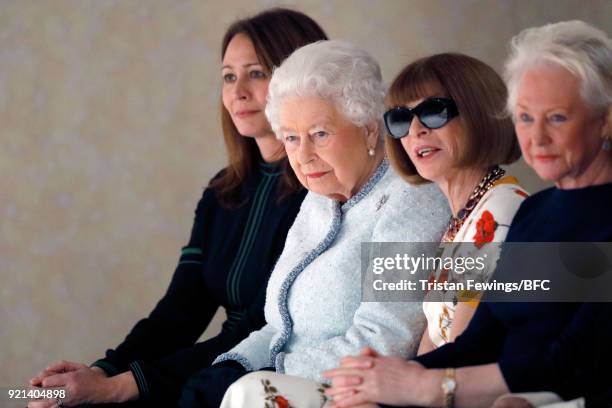 Chief Executive of the British Fashion Council Caroline Rush, Queen Elizabeth II and Anna Wintour attend the Richard Quinn show during London Fashion...