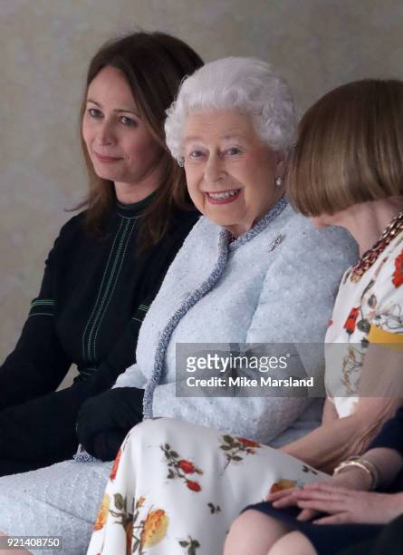 Queen Elizabeth II attends the Richard Quinn show during London Fashion Week February 2018 at BFC Show Space on February 20, 2018 in London, England.