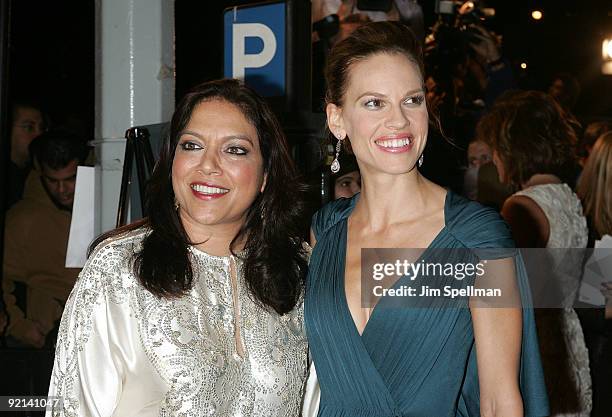 Director Mira Nair and Actress Hilary Swank attend the premiere of "Amelia" at The Paris Theatre on October 20, 2009 in New York City.