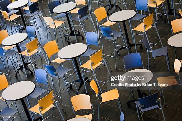 empty tables and chairs - college canteen stock pictures, royalty-free photos & images