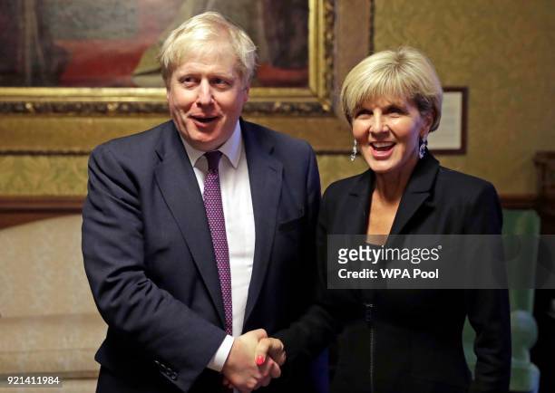 British Foreign Minister Boris Johnson greets Australian Foreign Minister Julie Bishop before their meeting at the Foreign and Commonwealth Office on...