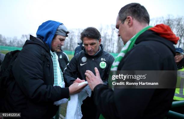 Bruno Labbadia , new head coach of Wolfsburg signs autographs after a training session of VfL Wolfsburg at Volkswagen Arena on February 20, 2018 in...