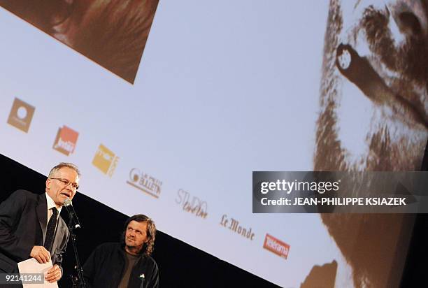 French Thierry Fremaux , President of the "Lumiere 2009", flanked by Serbian director Emir Kusturica, delivers a speech at the inauguration of this...