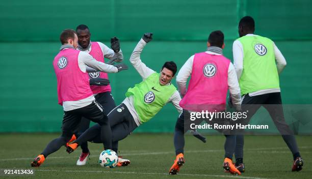 Maximilian Arnold, Josuha Guilavogui, Josip Brekalo, Renato Steffen and Riechedly Bazoer of Wolfsburg compete during a training session of VfL...