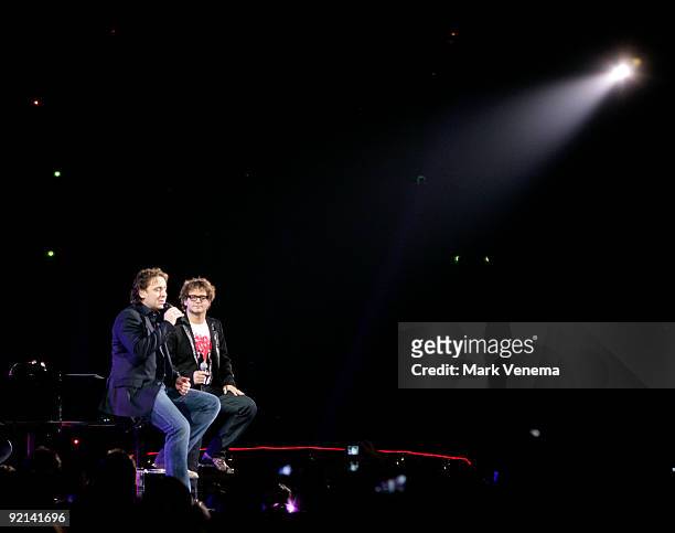 Marco Borsato and Guus Meeuwis perform live at Gelredome on October 20, 2009 in Arnhem, Netherlands.