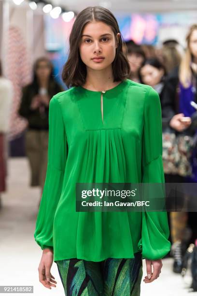 Model poses at the A by Jigsaw Presentation during London Fashion Week February 2018 at St James Emporium on February 20, 2018 in London, England.