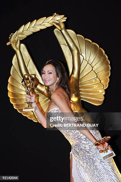 French pron actress Katsuni poses after being with her best French actress and best internet actress blog awards on October 20, 2009 in Paris during...