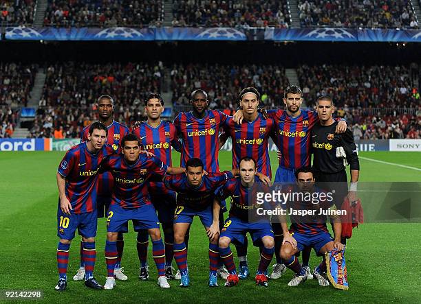Barcelona players pose for a team photograph prior to the UEFA Champions League group F match between FC Barcelona and FC Rubin Kazan at the Camp Nou...