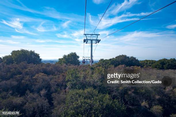Aerial gondola in the Oakland Hills above Oakland, California on a sunny day, November 21, 2017.