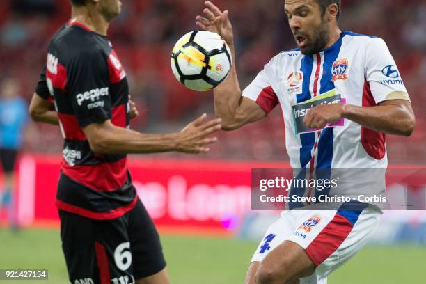Nikolai Topor-Stanley of the Jets gives away a penalty after a hand ball during the round one A-League match between the Western Sydney Wanderers and...