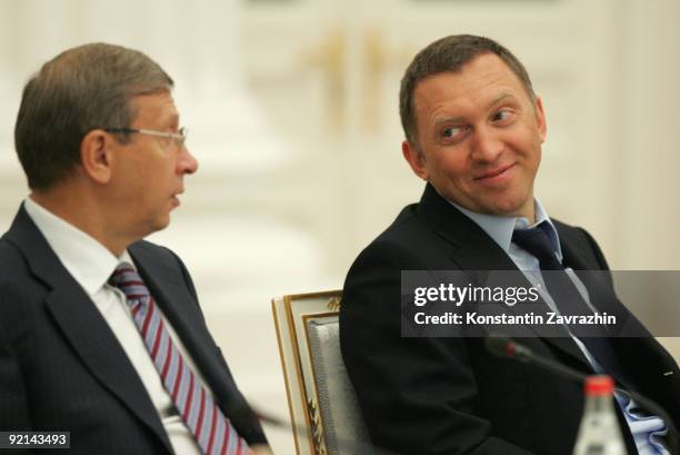 Russian businessmen and billionaires Vladimir Yevtushenkov and Oleg Deripaska attend a meeting amongst other business leaders with President Dmitry...