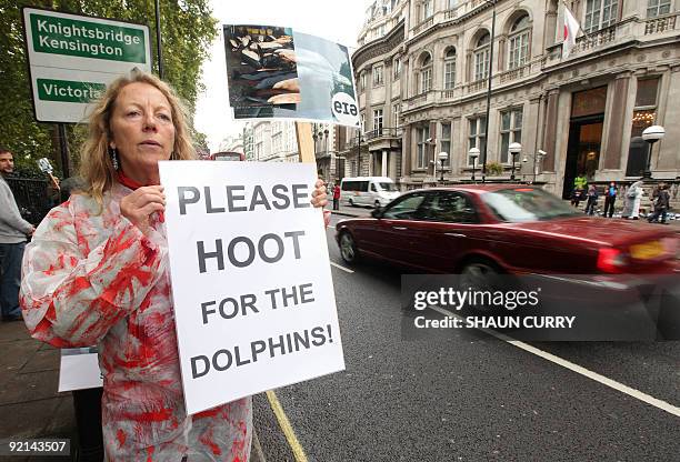 Protestor demonstrates outside the Japanese embassy in central London, on October 21, 2009. Demonstrators protested on Wednesday outside the Japanese...