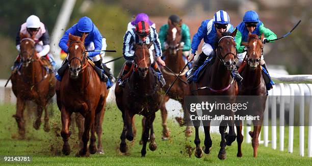 Richard Hills and Rasmy land Division I of The John Smith's Maiden Stakes Race run at Bath Racecourse on October 21, 2009 in Bath, England.